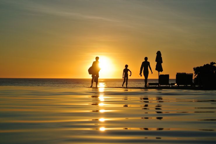 Family having fun with breathtaking sunset at JW Marriott Guanacaste