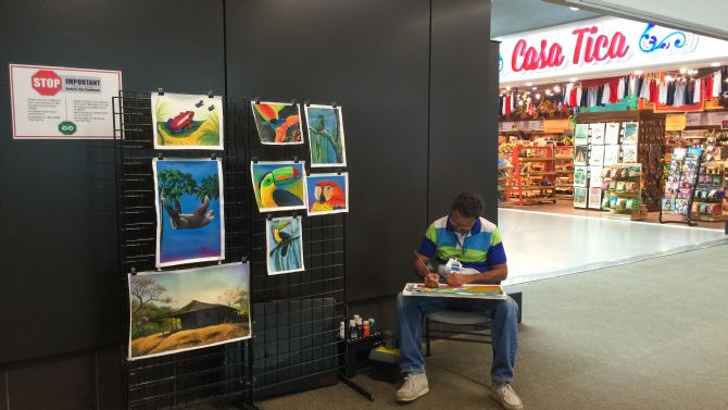 Local artist at the San José Intl Airport in Costa Rica