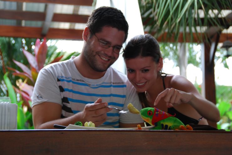 Javi the Frog enjoying a meal with a few locals at Iguana Verde B & B