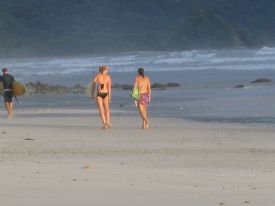 Girl Surfers walking on beach&nbsp;-&nbsp;Mal Pais, North Puntarenas