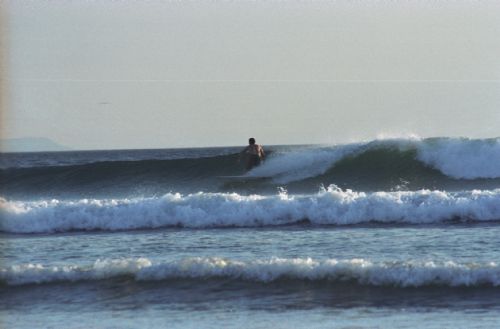 Surfer at Witches Rock (Roca Bruja)