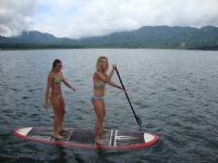 Try stand up paddle surfing