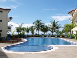 Enjoy the oversized free-form swimming pool.