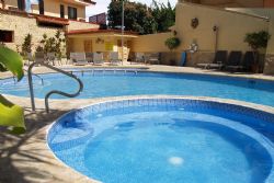 Solar-heated pool and Jacuzzi