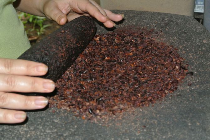 Cacao grinding before sugar added