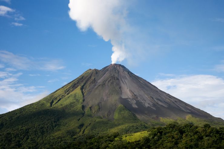 Arenal Volcano with smoke coming out of crater