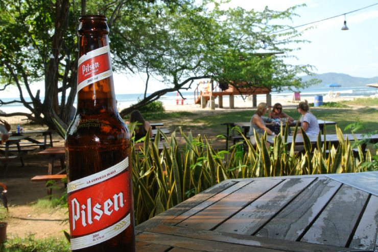 Having a refreshing Costa Rica beer in Tamarindo