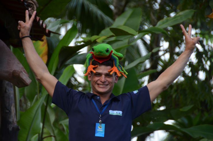 Javi the Frog on guide's head having fun