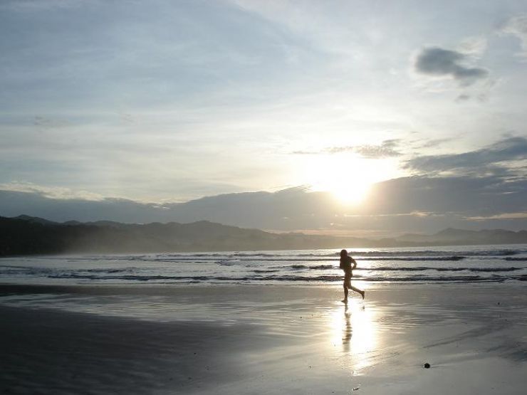 Jogging alone at Playa Samara