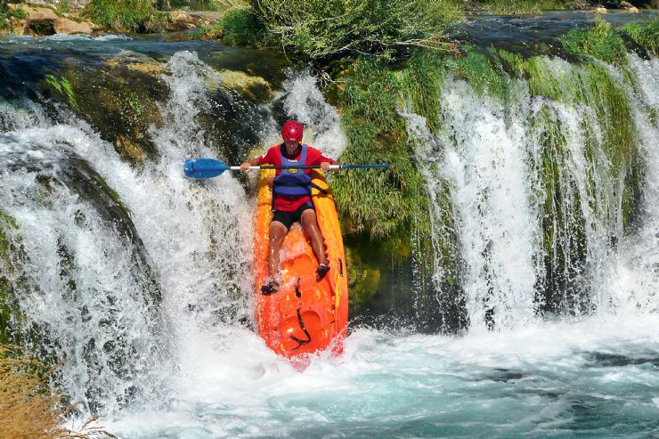 Kayaking over a small cascade in the Pilas section of the Sarapiqui river