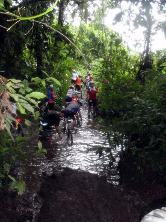 Mountain Biking through rivers at Ciclismo Earth