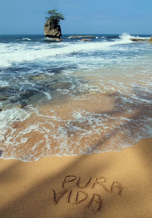 Costa Rica Pura Vida slogan on Manzanillo Sand