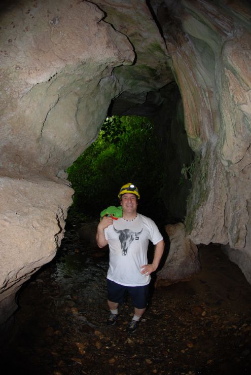 Tourist holding Javi the Forg in Venado Caves