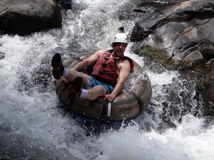 Todd having fun on a white water tubing tour in the Rio Negro