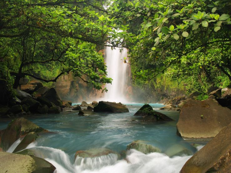 Amazing Rio Celeste Waterfall through Trees