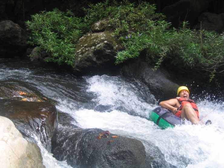 Happy while white water tubing on the Rio Negro, Costa Rica