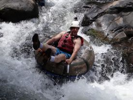 Todd having fun on a white water tubing tour in the Rio Negro
