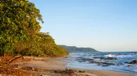 Tourists on the main strip of Santa Teresa on south coast of the