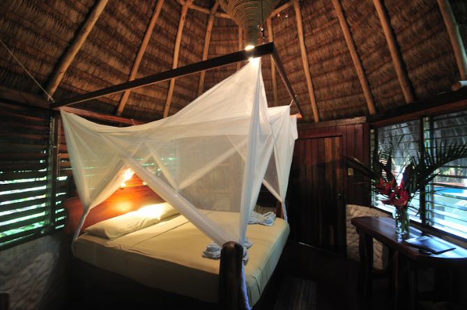 Bedroom at Encanta La Vida Rainforest Lodge