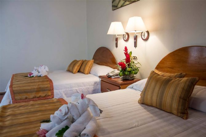 Cozy rooms at Arenal Paraíso Resort & Thermo Mineral Hot Springs