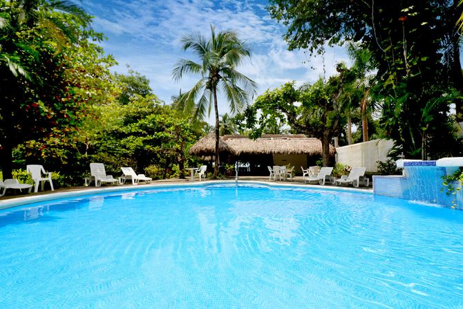 Enjoy and relax in the pool at Karahe Beach Hotel