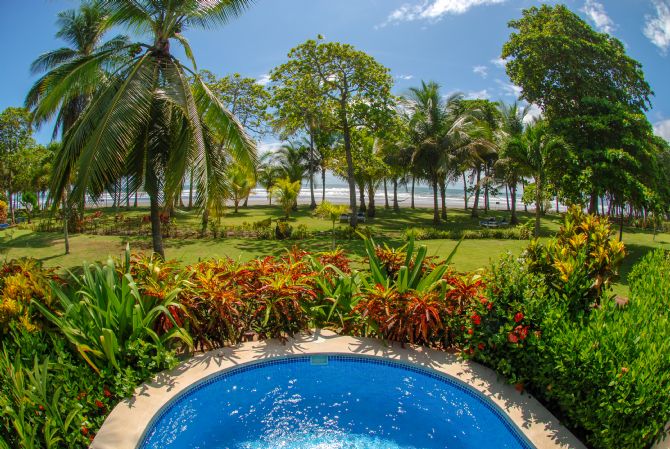 View of beach from private plunge pool at Alma Del Pacifico