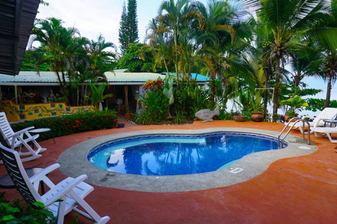 Swimming pool area at Cabinas Jimenez