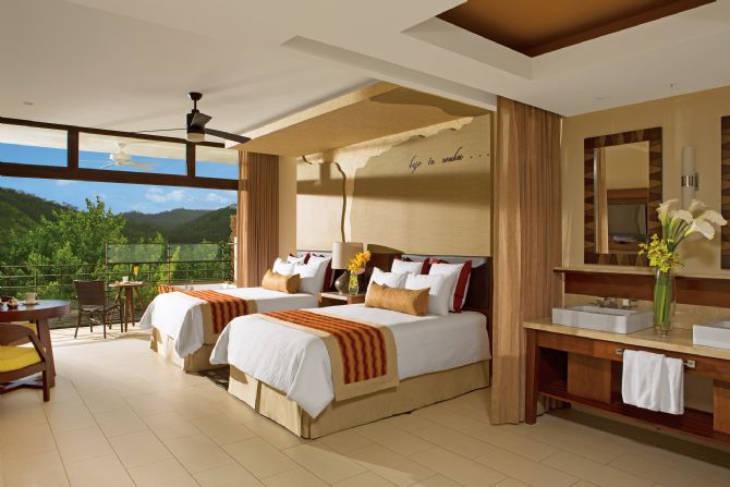 Suite double bed at Dreams Las Mareas Costa Rica
