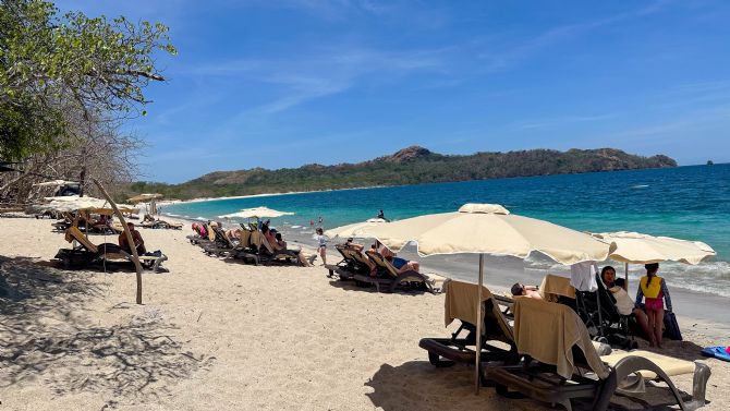 Beach chairs and umbrellas at the Westin Reserva Conchal