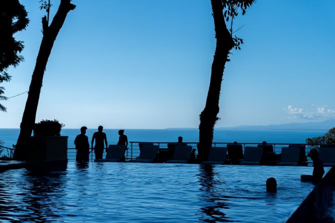 Guests relaxing at Los Altos Resort pool