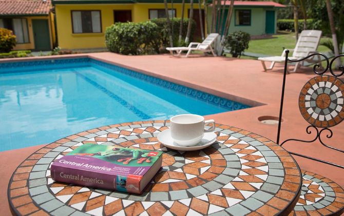 Relax at the pool at Hotel Bristol Aeropuerto