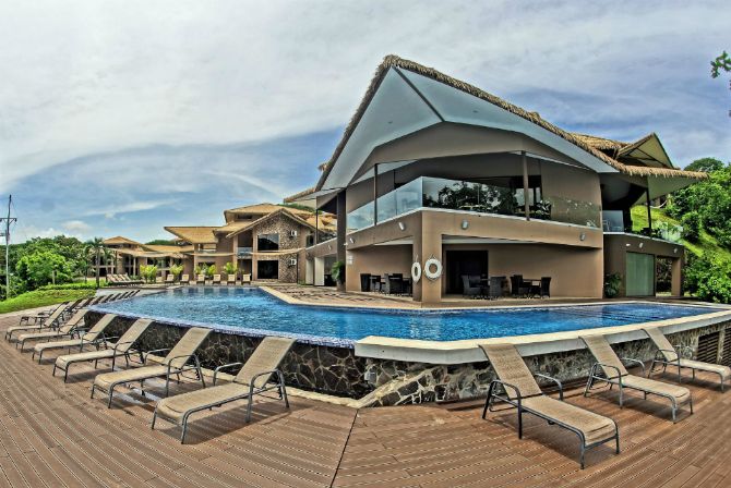 Relaxing pool chairs at Nammbu Beachfront Bungalows