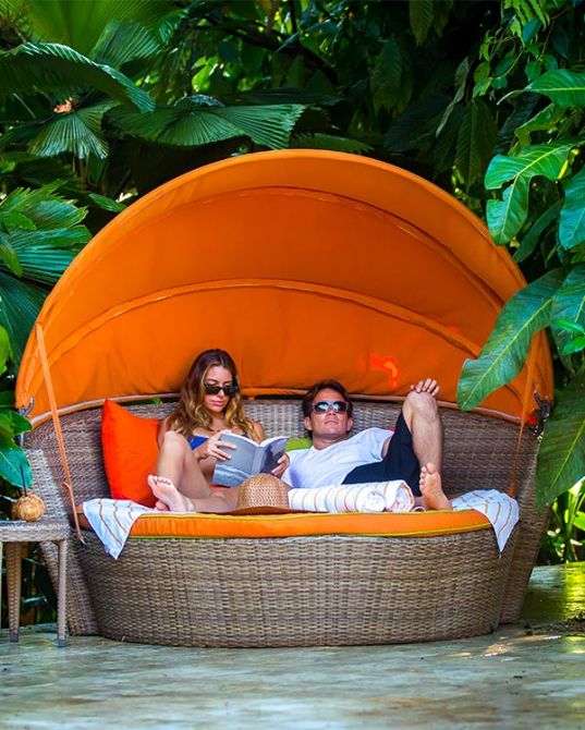 Relax at a pool cabina at Nayara Resort Spa and Gardens