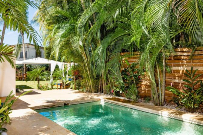 Outdoor pool at Café Playa Negra Hotel