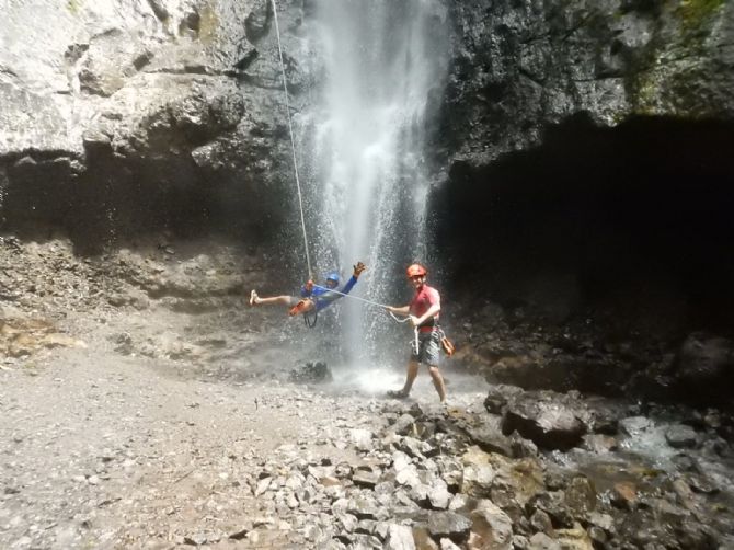 Happy customer having fun at Pure Trek Canyoning