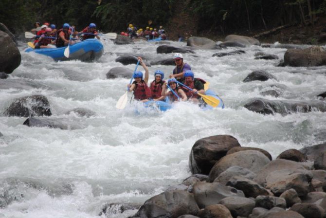 Rafting group in the wild river