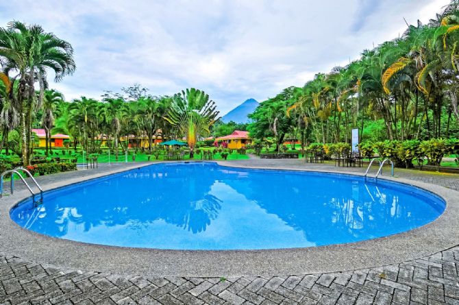 Hotel pool with Arenal Volcano