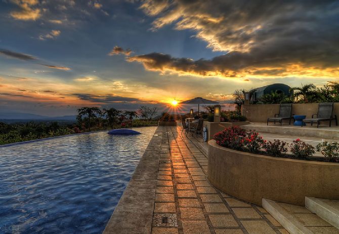 Sunset from Pool of Xandari Resort Hotel & Spa