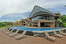 Relaxing pool chairs at Nammbu Beachfront Bungalows